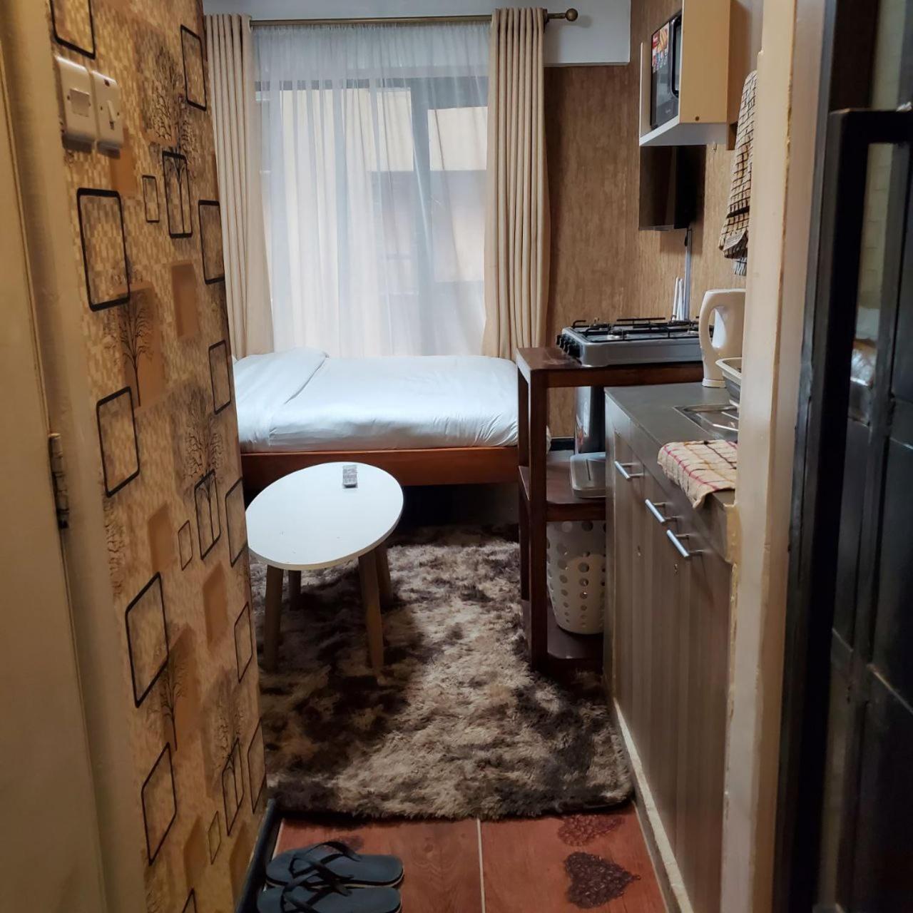 Apartamento Lovely & Cozy Compact Studio Near Airport With Rooftop View Nairobi Exterior foto